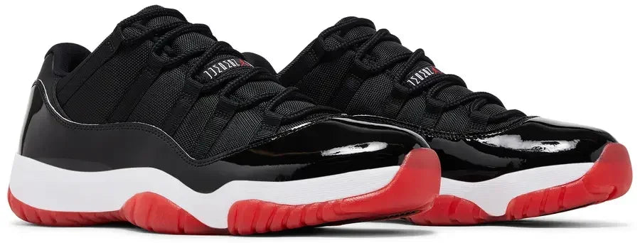 Pair Jordan 11 Retro Low Bred (2025)