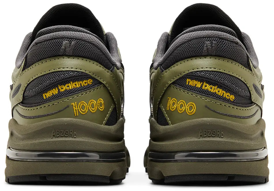 New Balance 1000 Dark Olivine Magnet heel counter